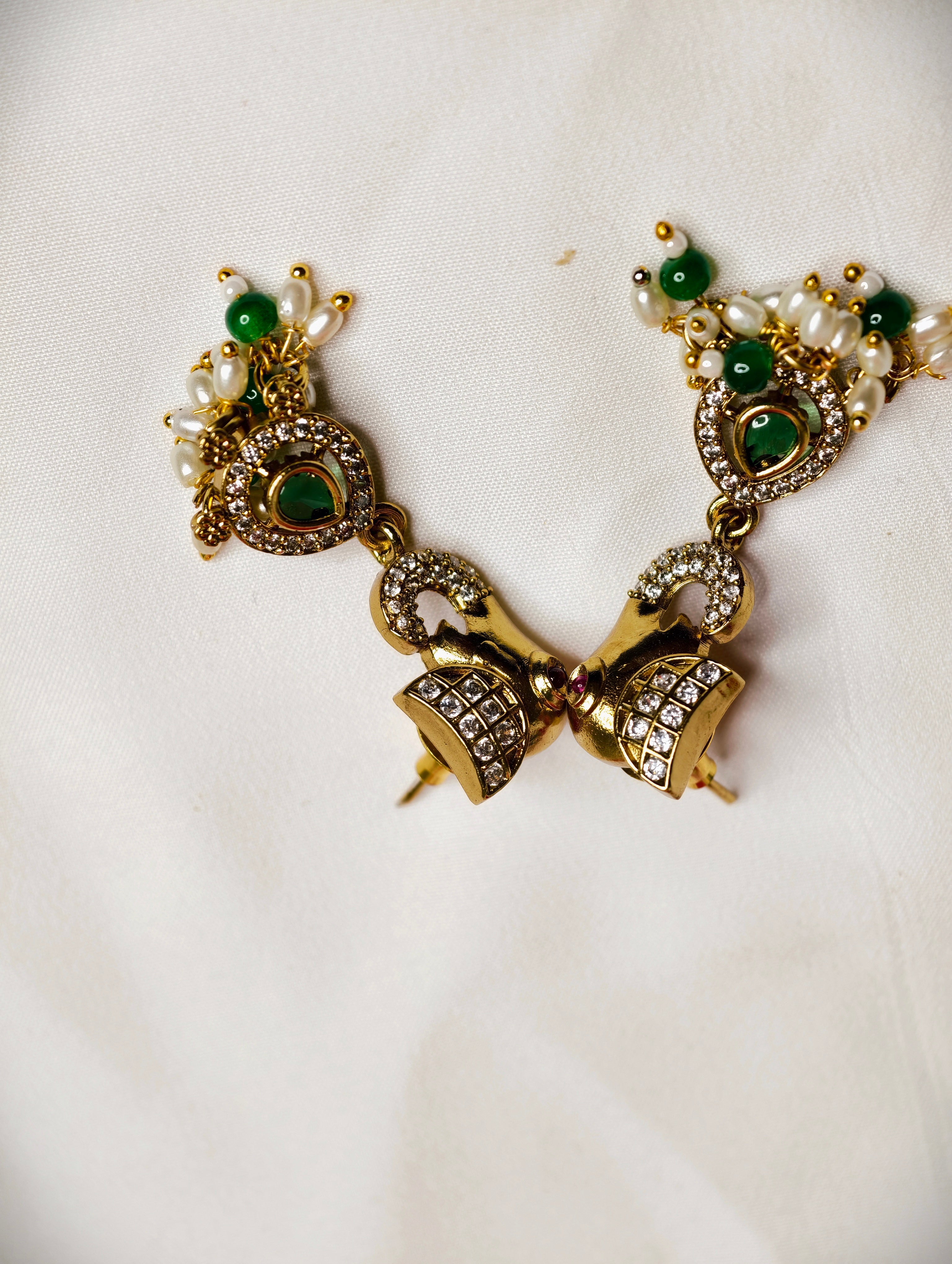 Traditional Elephant Motif Necklace Set with AD Stone Detailing