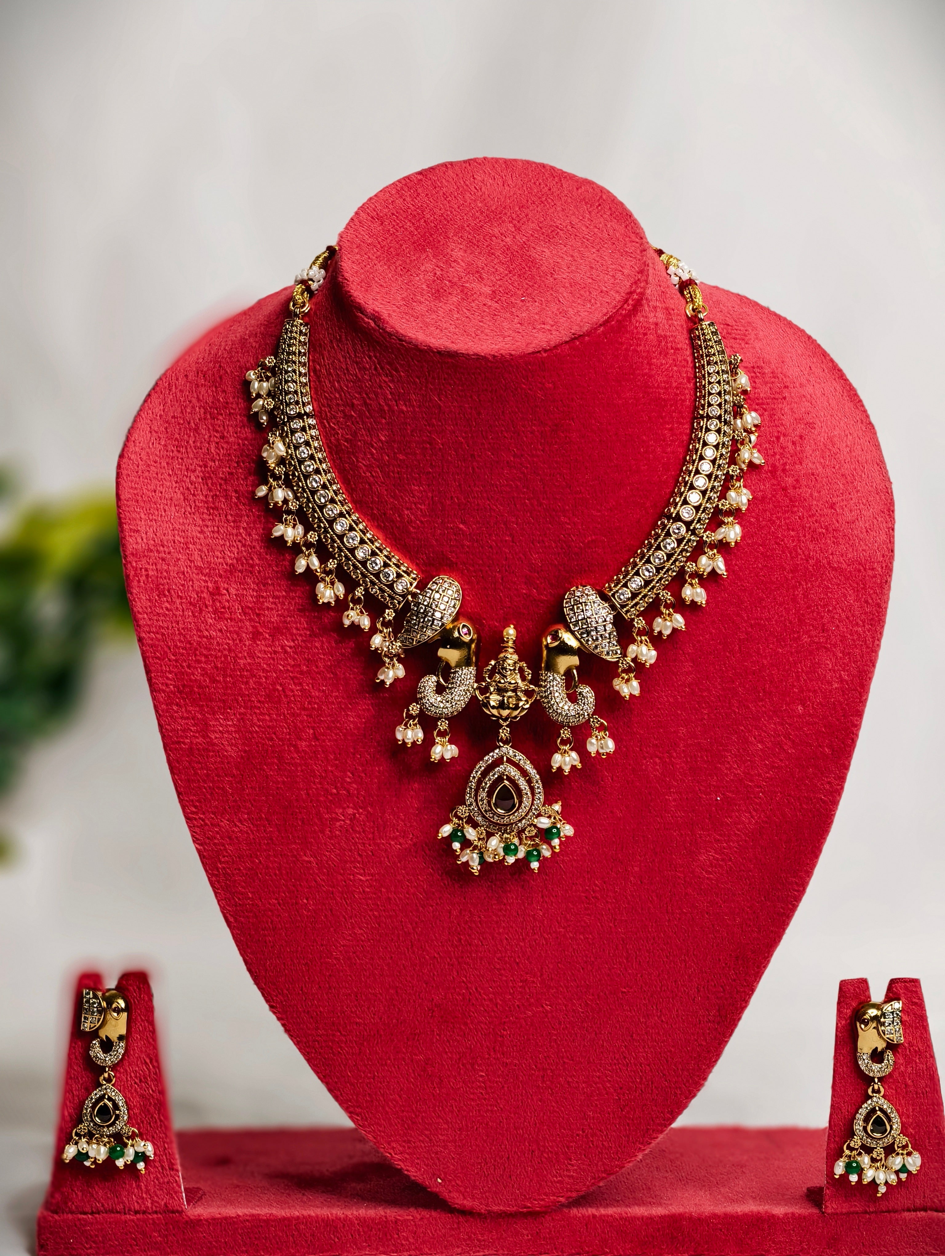 Traditional Elephant Motif Necklace Set with AD Stone Detailing